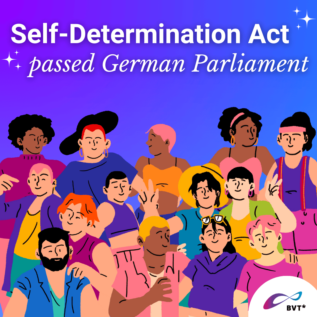Graphic. It says "The Self-Determination Act passed German Parliament!" White lettering on a purple background. Glittering stars can be seen around the lettering. Below the lettering is a group of people. Everyone is smiling, they look relaxed and are having a good time together. Some are holding a glass with a drink, some are hugging each other and waving. Some are standing, some are sitting on the floor. The people have different gender expressions, some have long hair, some have short hair, some wear pants, some wear dresses. They have different hair and skin colors. Some have beards, some have earrings.